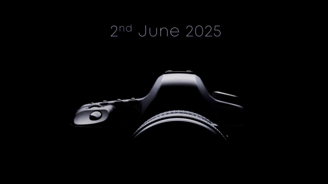 A silhouette of a camera against a black background, with the date "2nd June 2025" displayed above in light typography