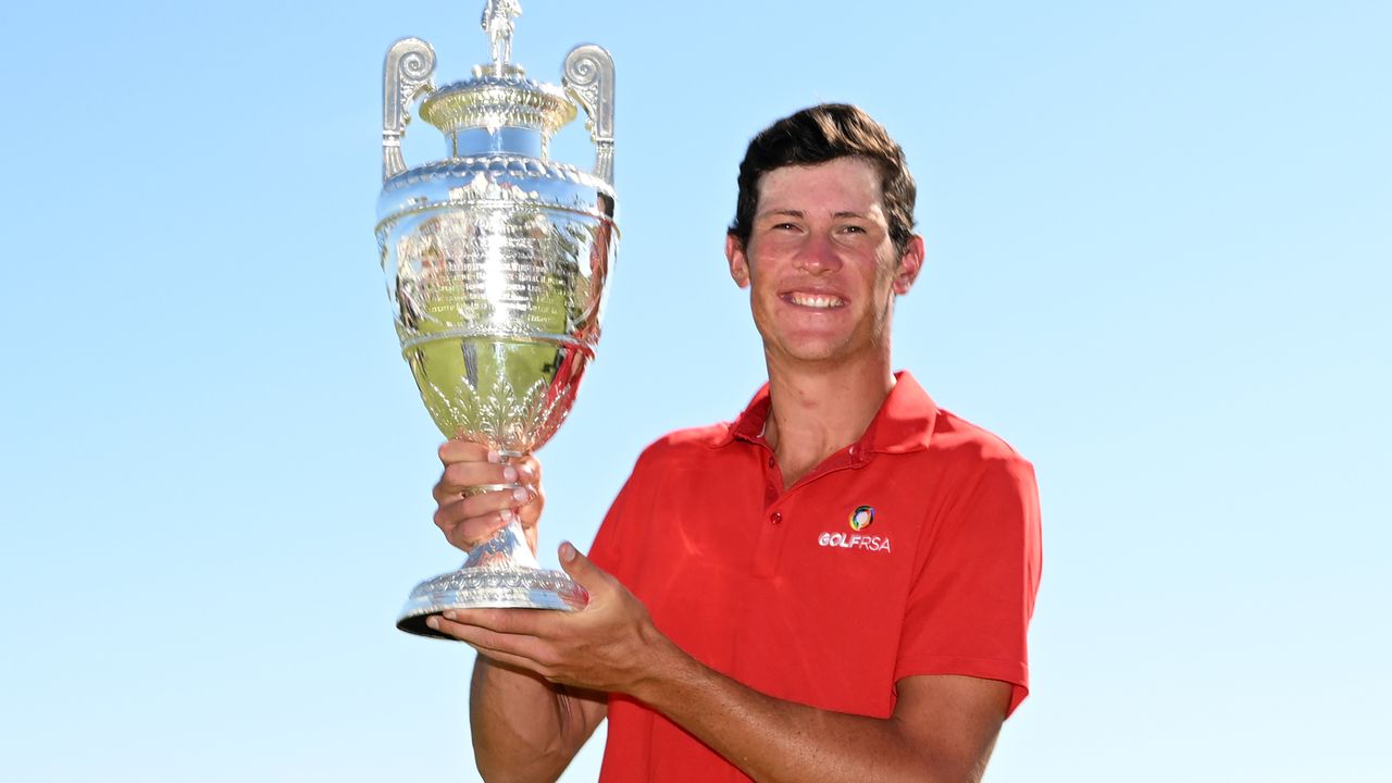 Christo Lamprecht with the trophy after winning the 2023 Amateur Championship at Hillside Golf Club