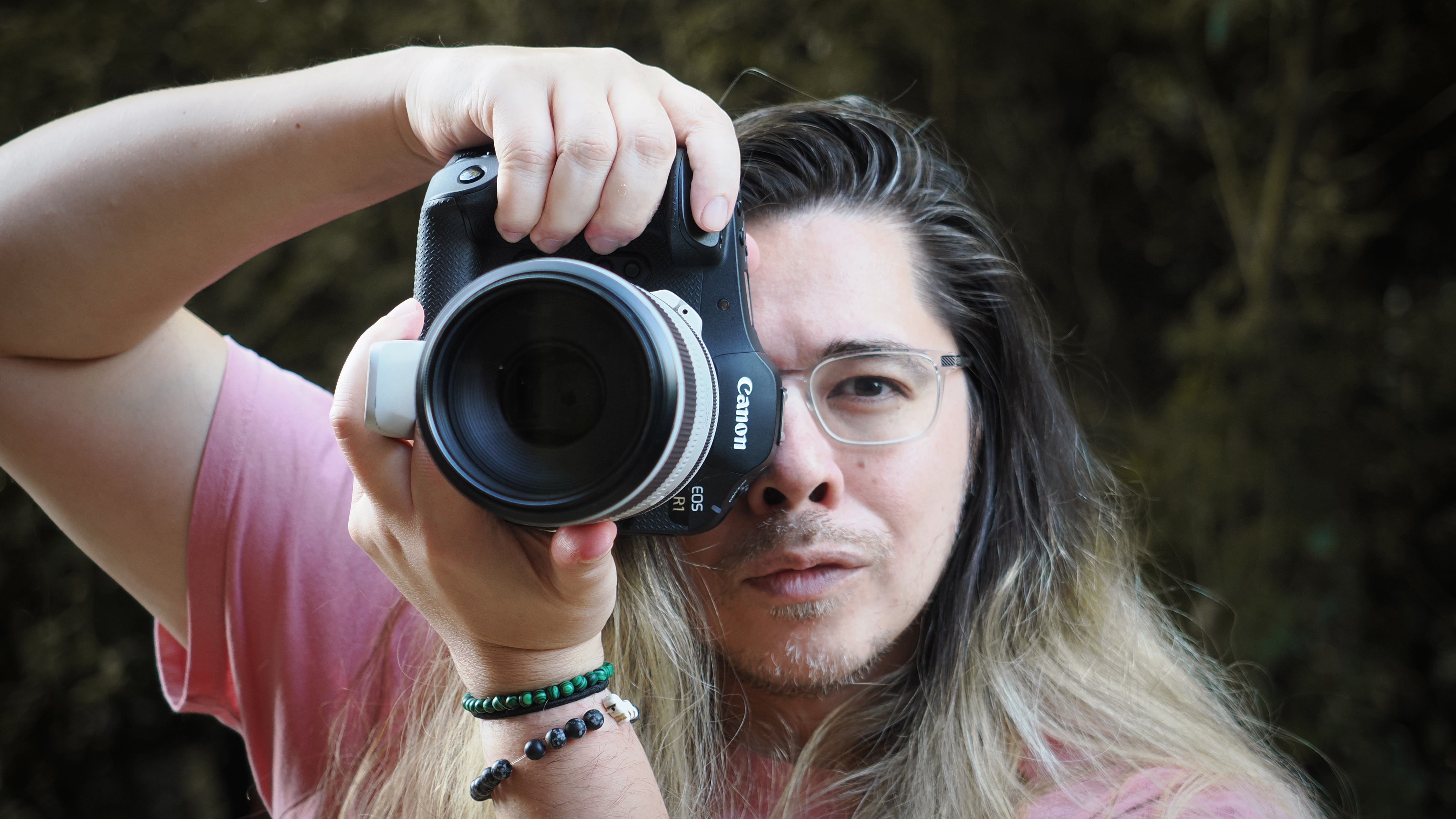 James Artaius holding a Canon EOS R1 with RF 100-500mm lens