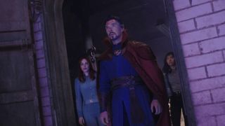 Rachel McAdams, Benedict Cumberbatch and Xochitl Gomez stand in a doorway