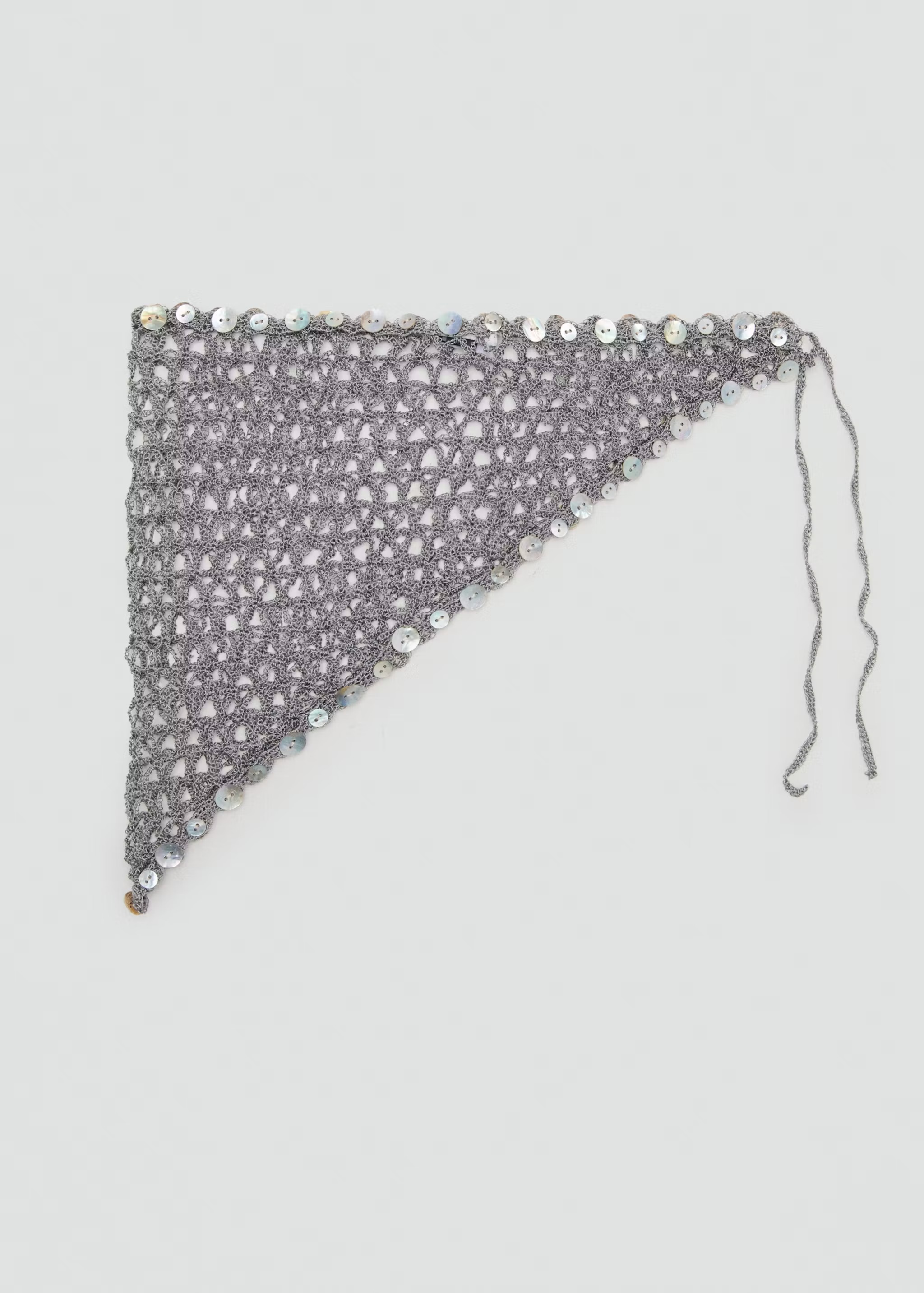 Crochet shawl with common, decorative buttons