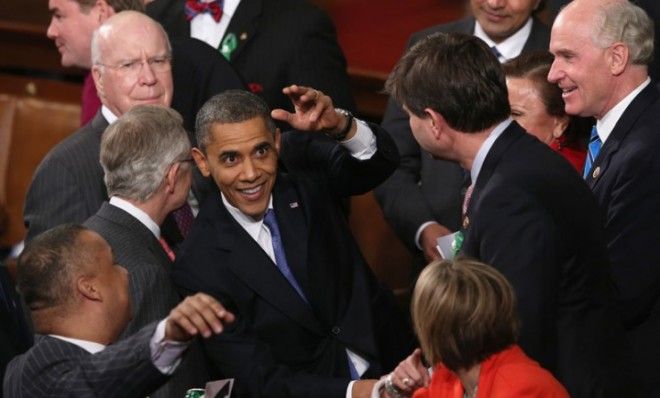 President Obama greets members of Congress after his State of the Union address on Feb. 12.