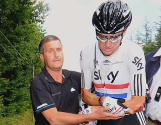 Dr. Richard Freeman with Bradley Wiggins after a crash at the 2011 Tour de France