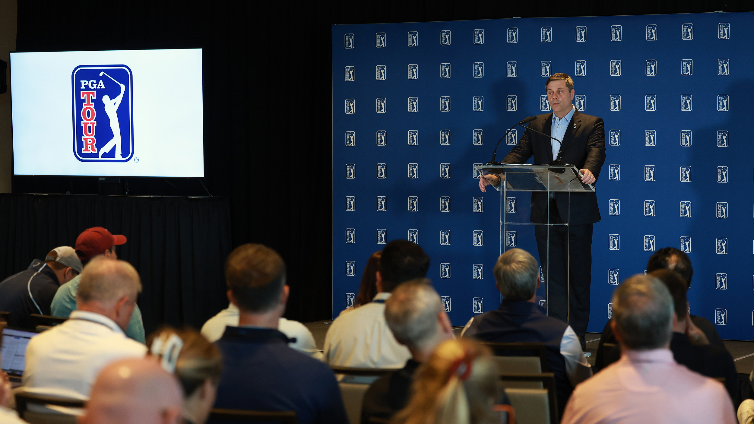 Brian Rolapp speaks to media at a PGA Tour press conference