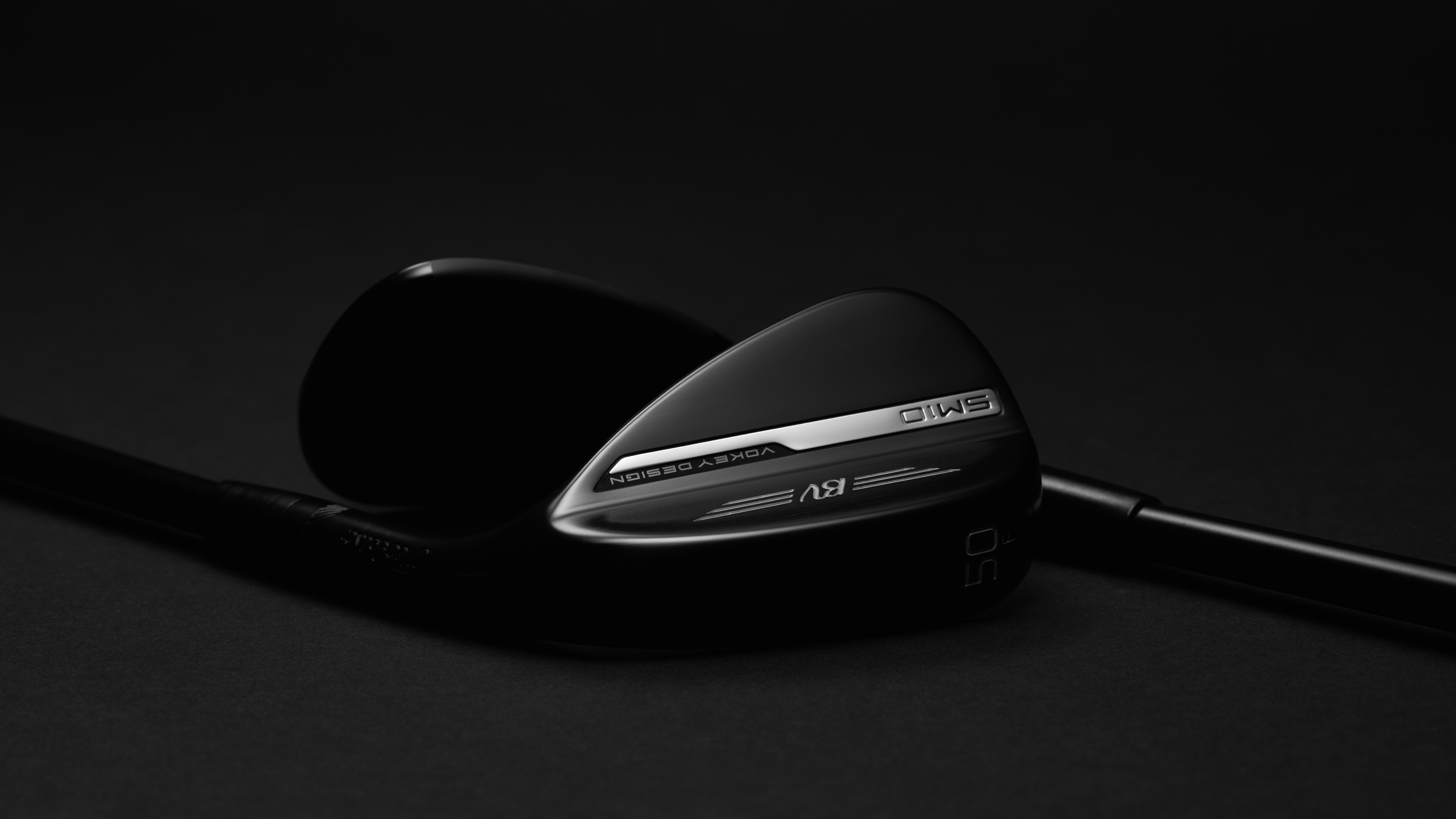 A general shot of the Titleist Vokey SM10 wedge in black vapor finish