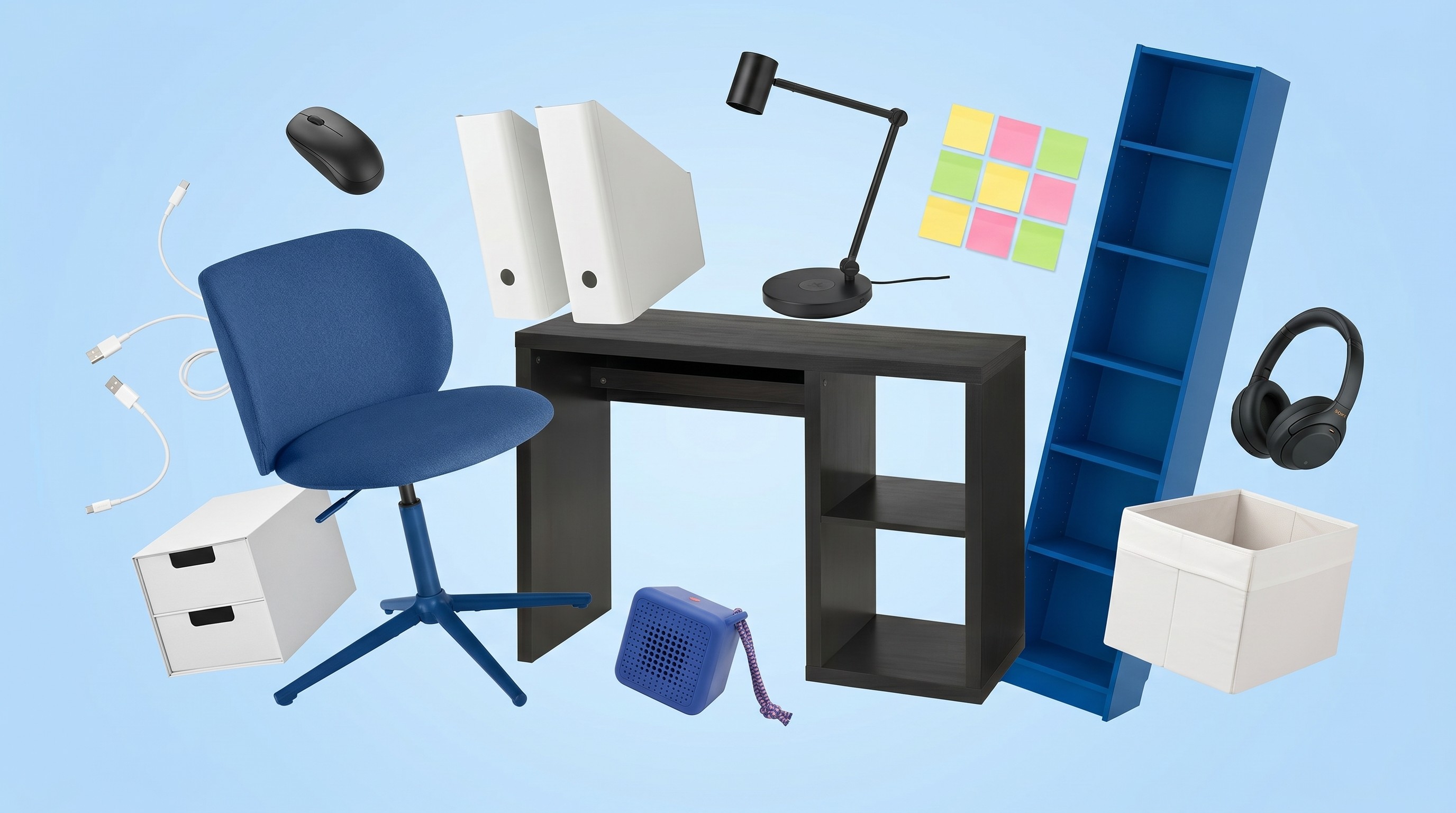 Collection of blue, white, and black office furniture and accessories, including blue IKEA Billy bookcase