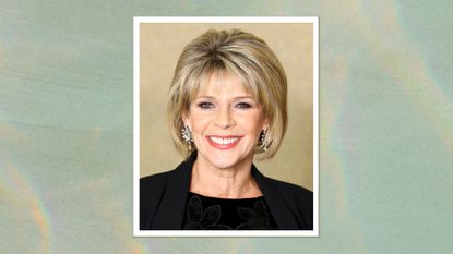 Image of Ruth Langsford smiling with a blonde bob and fringe, wearing a black top and blazer, on a green watercolour background