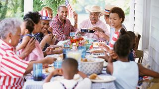 A family at a July 4 barbecue, a day of celebration in American culture