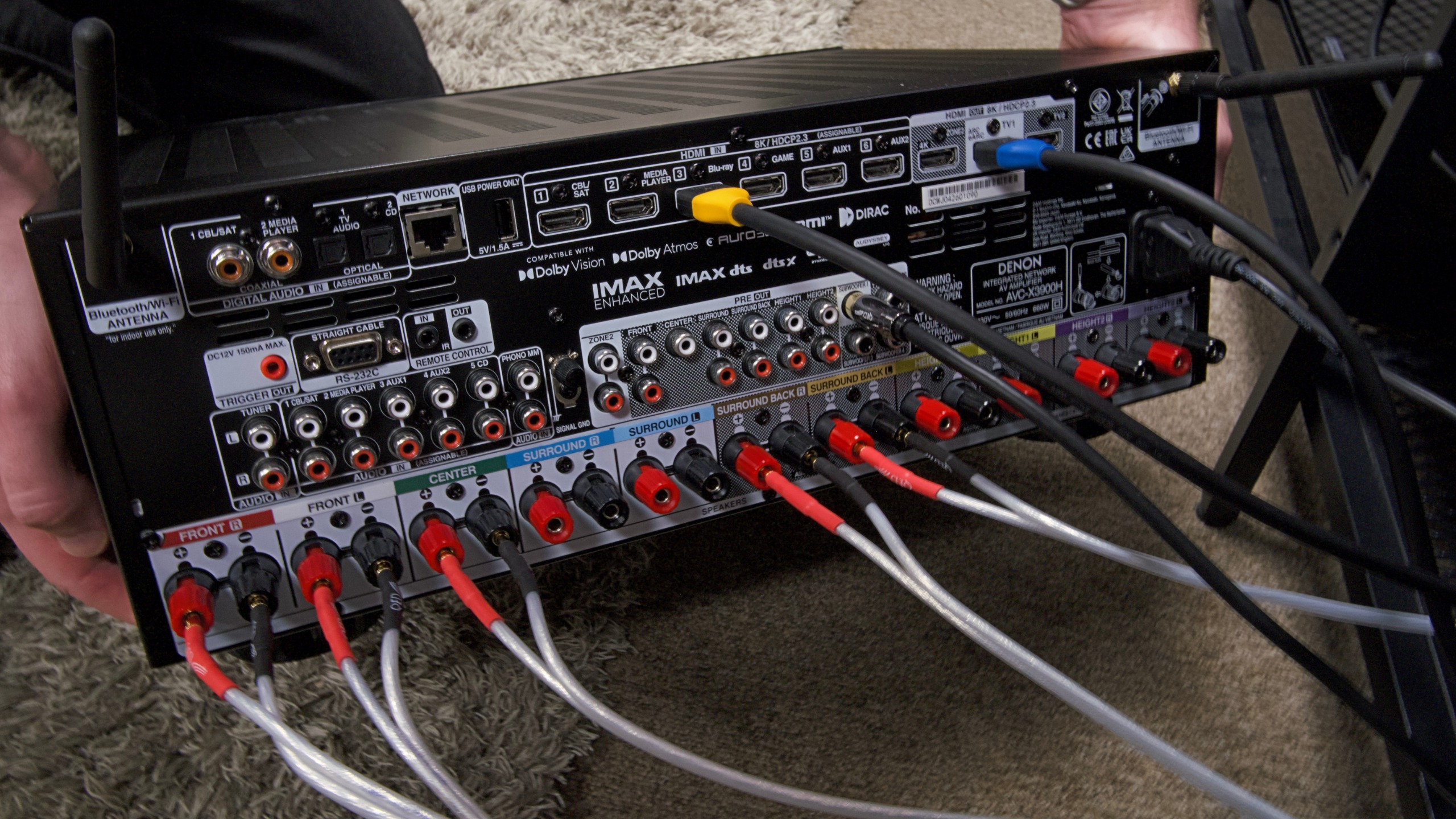 Shot of rear panel of Denon AVC-3900H with QED XT25 terminated speaker cables and HDMI cables plugged in