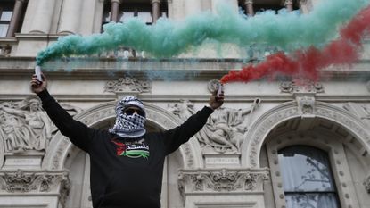 A pro-Palestinian demonstrator outside Downing Street