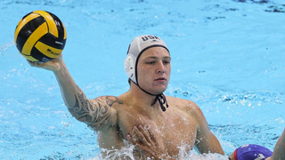 Hannes Daube of Team USA battles for the ball ahead of the Serbia vs USA Men&#039;s Water Polo Semi Final at Olympics 2024