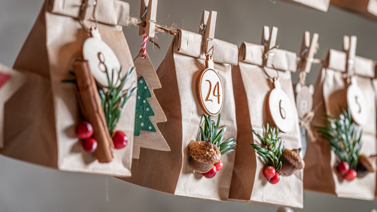 Creative advent Calendar for Christmas as countdown on the background of gray wall