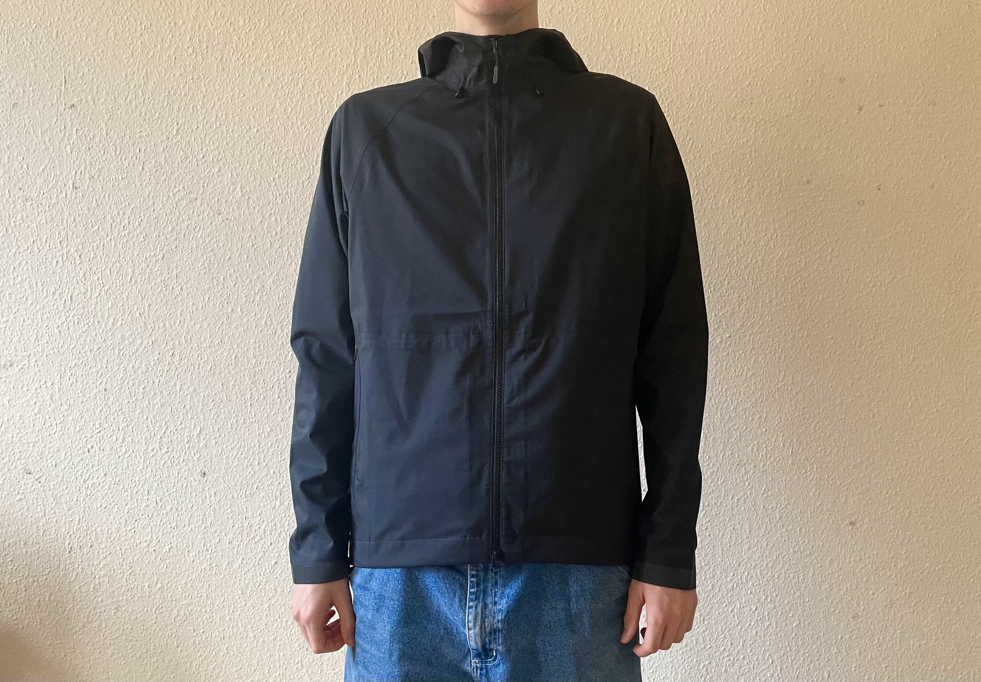 Person wearing black Chrome Storm Salute which is one of the best commuter cycling jackets