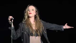 Lzzy Hale onstage with Halstorm
