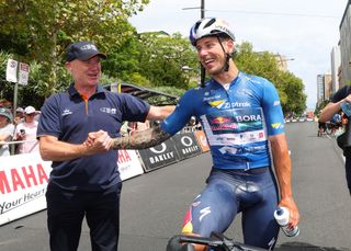 ADELAIDE AUSTRALIA JANUARY 26 Stage Winner Australian Sam Welsford riding for Red BullBoraHansgrohe with race director Stuart OGrady after the race during day nine of the 2025 Tour Down Under on January 26 2025 in Adelaide Australia Photo by Sarah ReedGetty Images