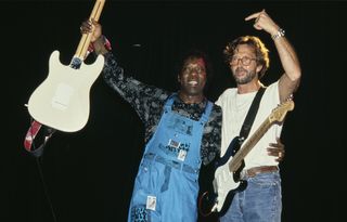 Buddy Guy and Eric Clapton perform on stage in Los Angeles, California, United States, September 1991.