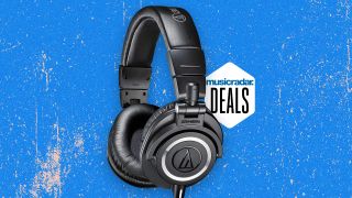 Audio-Technica ATH-M50x headphones on a blue background