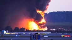 A fireball erupts following the crash of UPS Airlines Flight 2976 in Louisville, Kentucky.