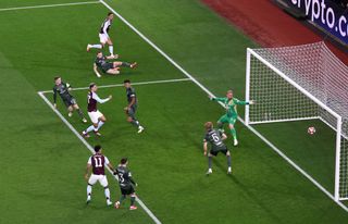 BIRMINGHAM, ENGLAND - JANUARY 29: Morgan Rogers of Aston Villa scores his team's first goal past Kasper Schmeichel of Celtic during the UEFA Champions League 2024/25 League Phase MD8 match between Aston Villa FC and Celtic FC at Villa Park on January 29, 2025 in Birmingham, England. (Photo by Aston Villa/Getty Images)