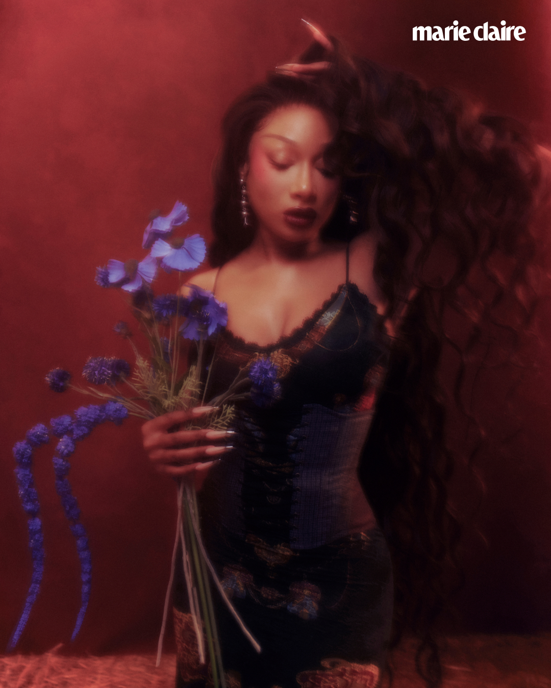 Megan Thee Stallion poses for Marie Claire in a hazy photo
