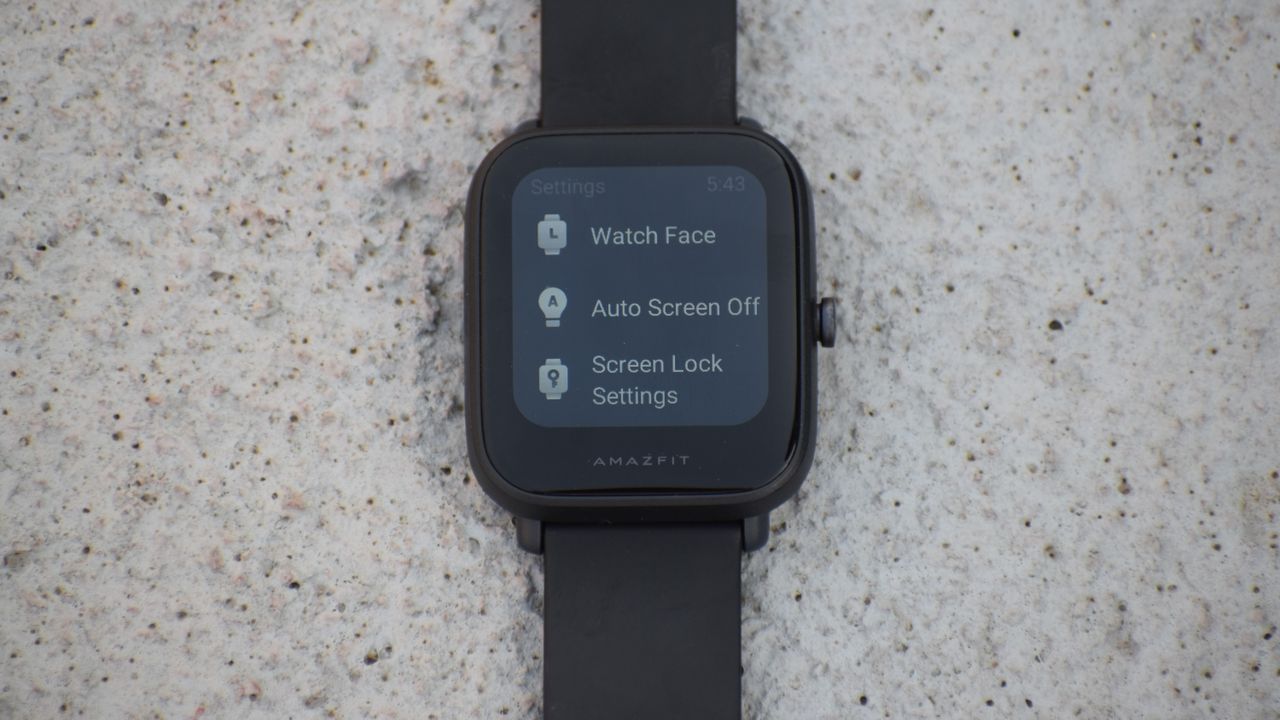 An Amazfit Bip U Pro with the screen on