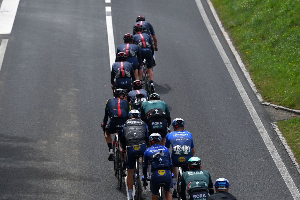 SAINTIMIER SWITZERLAND APRIL 29 Geraint Thomas of The United Kingdom Andrey Amador Bikkazakova of Costa Rica Rohan Dennis of Australia Yellow Leader Jersey Eddie Dunbar of Ireland Filippo Ganna of Italy Richie Porte of Australia and Team INEOS Grenadiers lead The Peloton during the 74th Tour De Romandie 2021 Stage 2 a 1657km stage from La Neuveville to SaintImier TDR2021 TDRnonstop UCIworldtour on April 29 2021 in SaintImier Switzerland Photo by Luc ClaessenGetty Images