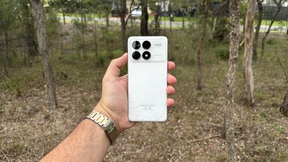 Poco F6 Pro in white from the back showing its Camera array and branding