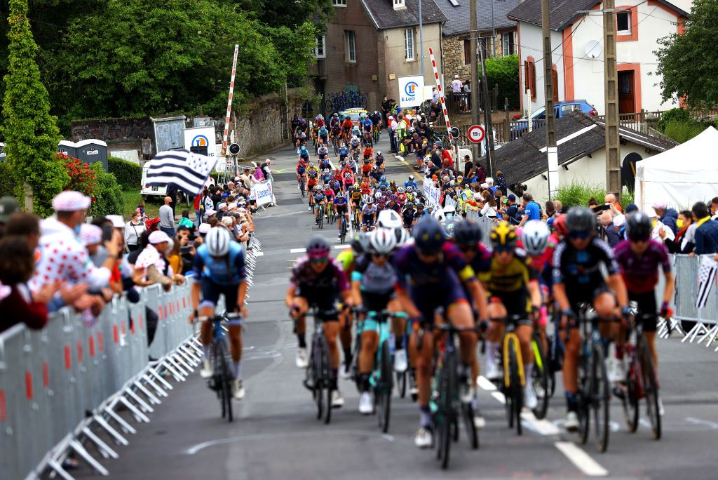 LANDERNEAU FRANCE JUNE 26 The Peloton and The Breakaway passing through Cte De La Fosse Aux Loups 176m during the 8th La Course By Le Tour De France 2021 a 1077km race from Brest to Landerneau Cte De La Fosse Aux Loups 176m LaCourse LeTour TDF2021 UCIWWT on June 26 2021 in Landerneau France Photo by Tim de WaeleGetty Images