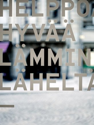 Looking through letters on the window of a cafe