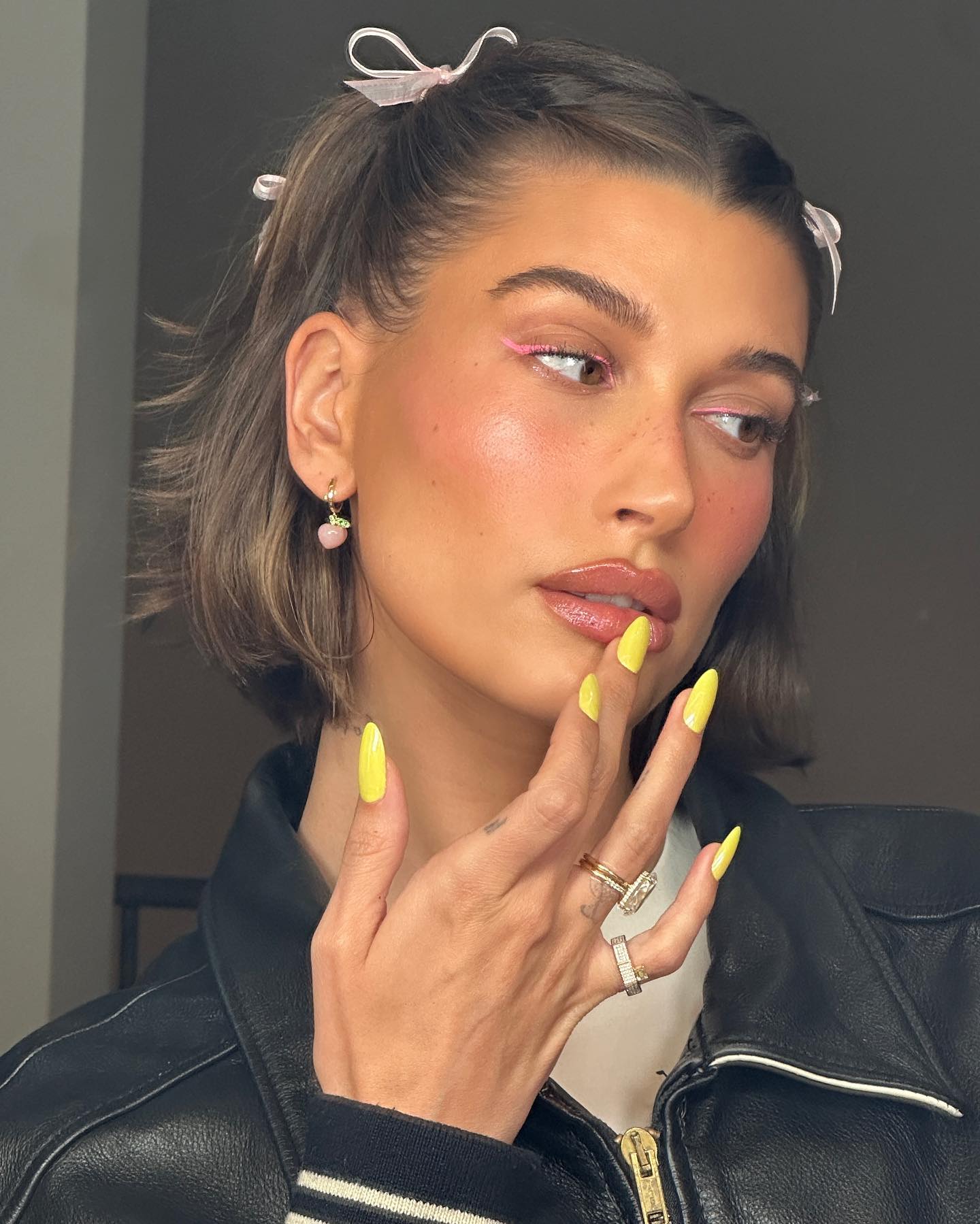 @haileybieber yellow manicure