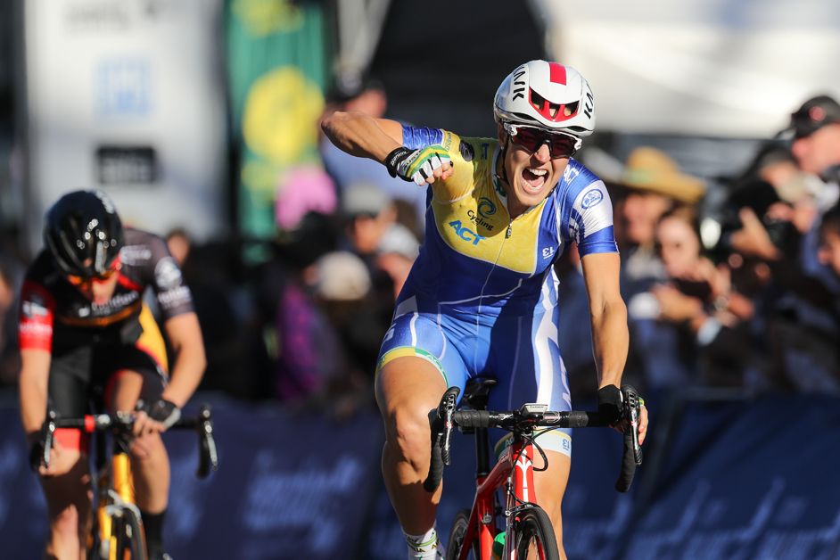 Rebecca Wiasak celebrates her victory