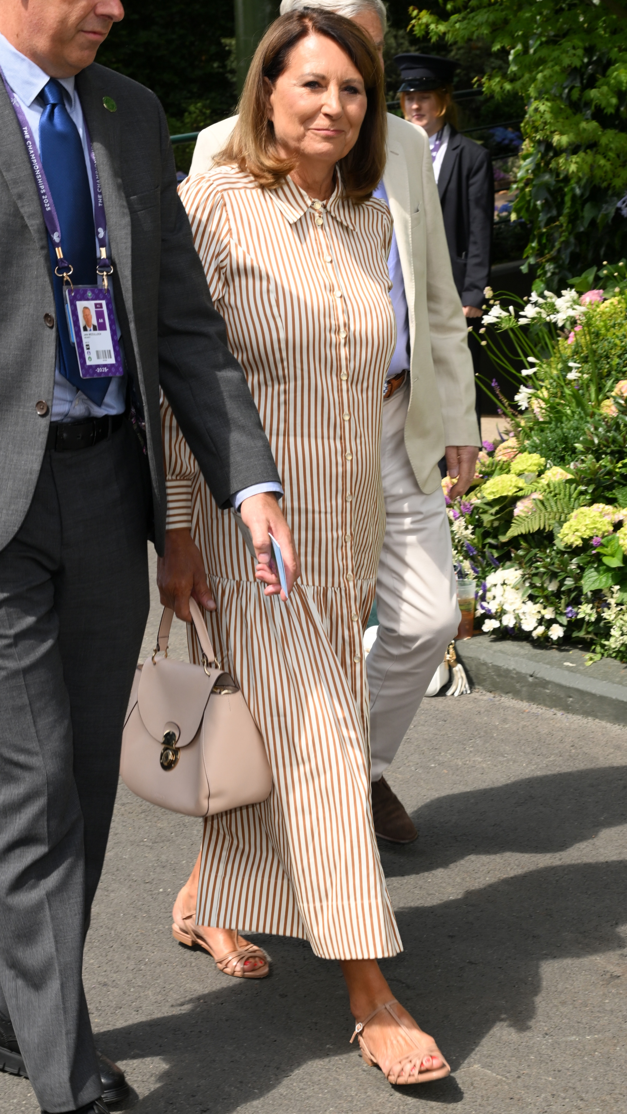 Carole Middleton walks to attend day eight of the Wimbledon Tennis Championships