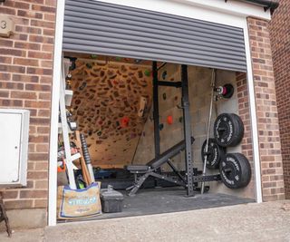 garage home gym with climbing wall