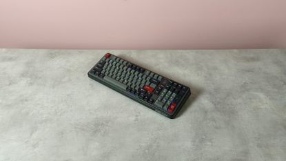 Top-down view of MechLands Vibe99 on table with pink wall in background