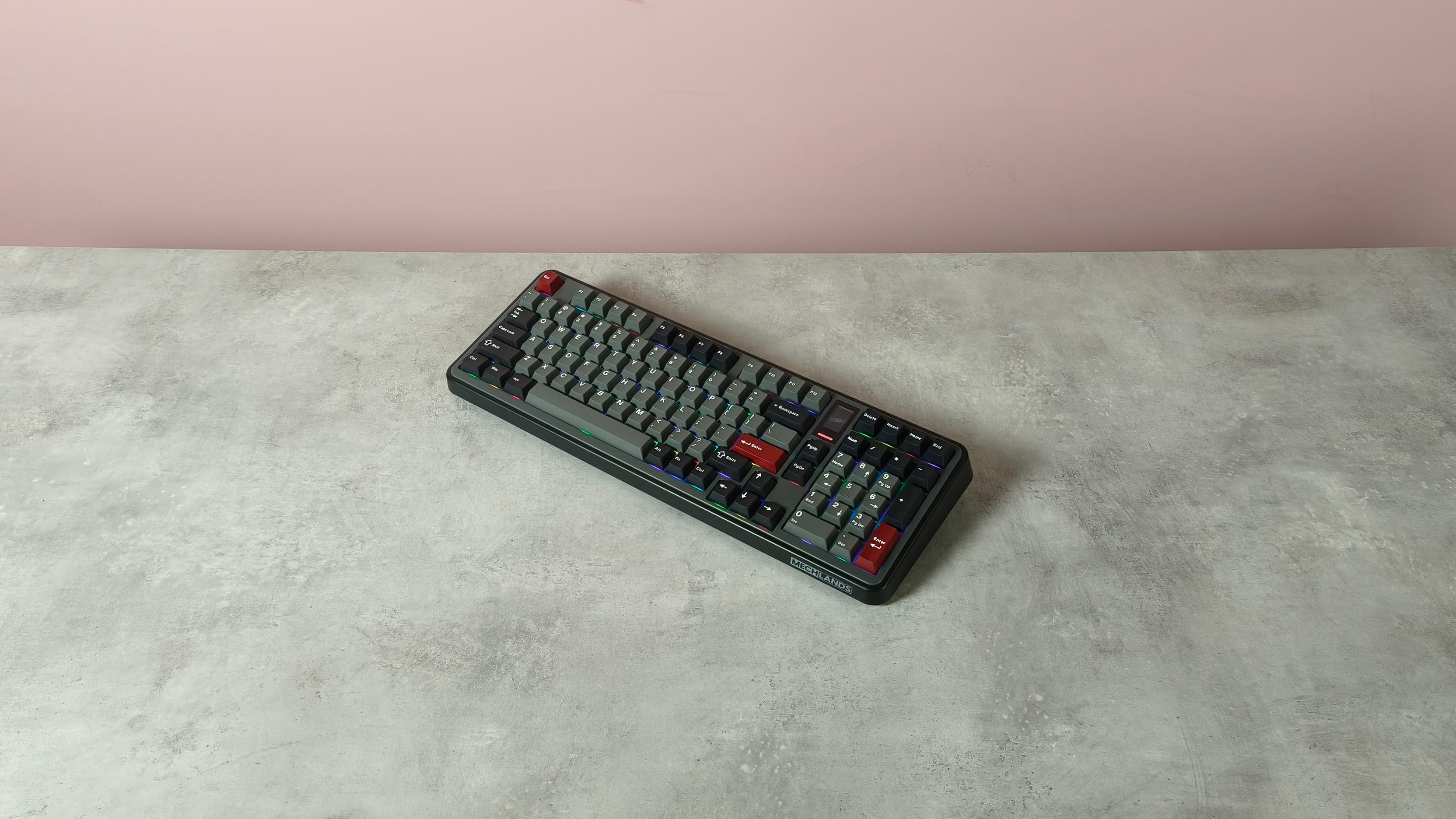 Top-down view of MechLands Vibe99 on table with pink wall in background