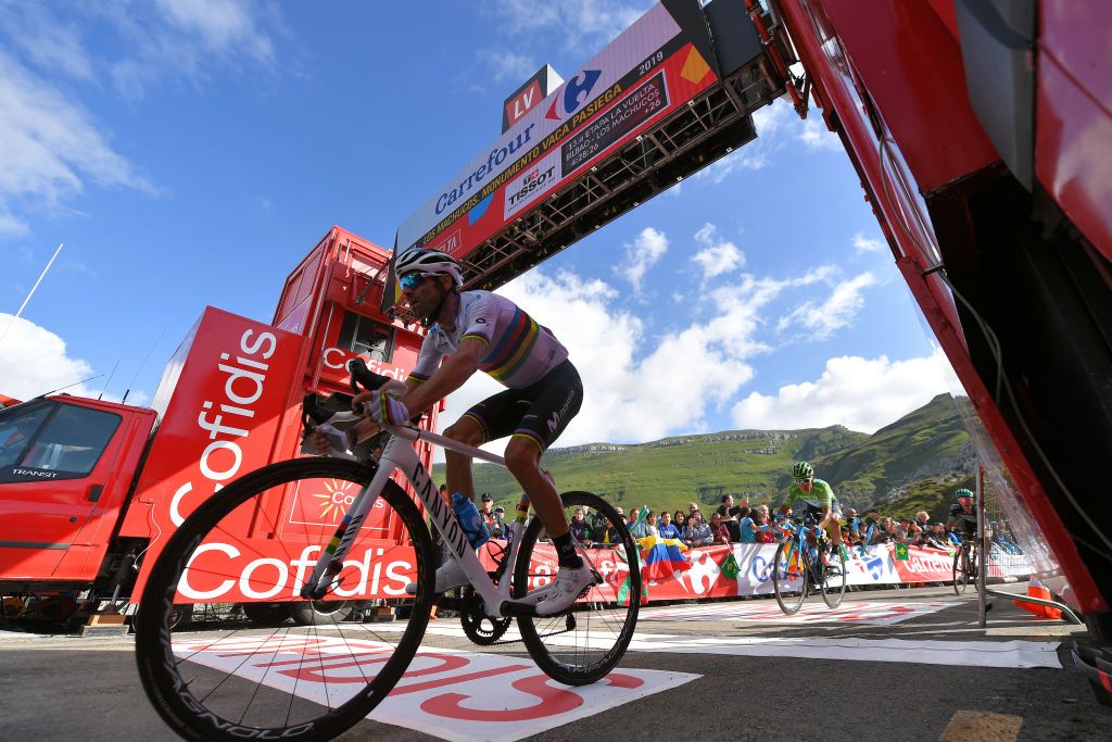 Alejandro Valverde crosses the line at the end of stage 13