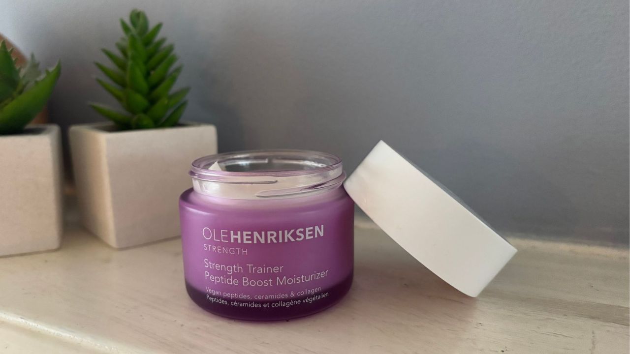 A pot of ole henriksen strength trainer peptide moisturiser