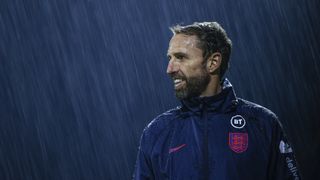 A photo of ex-England manager Gareth Southgate standing in the rain