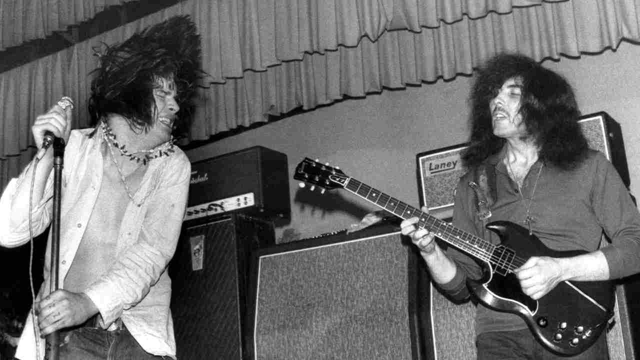 Black Sabbath performing onstage in 1969