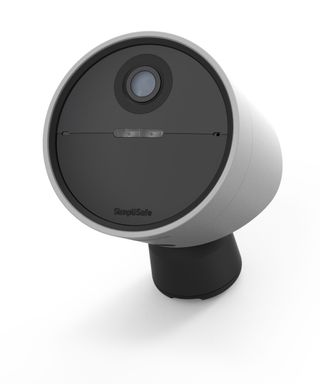 a security camera with a white body and black front