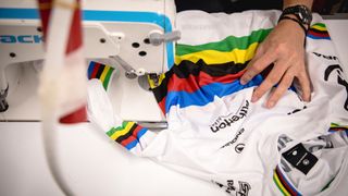 Charlie Hatton's rainbow jersey being sewn together