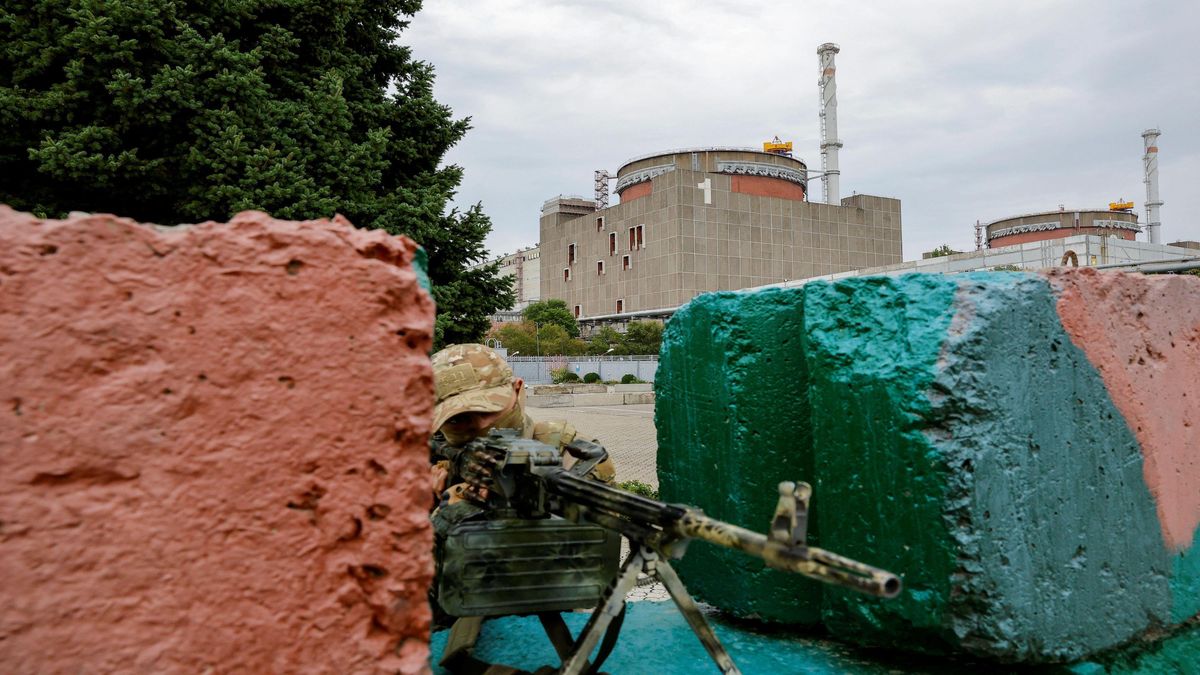 A Russian soldier guarding a checkpoint at the Zaporizhzhia plant. 