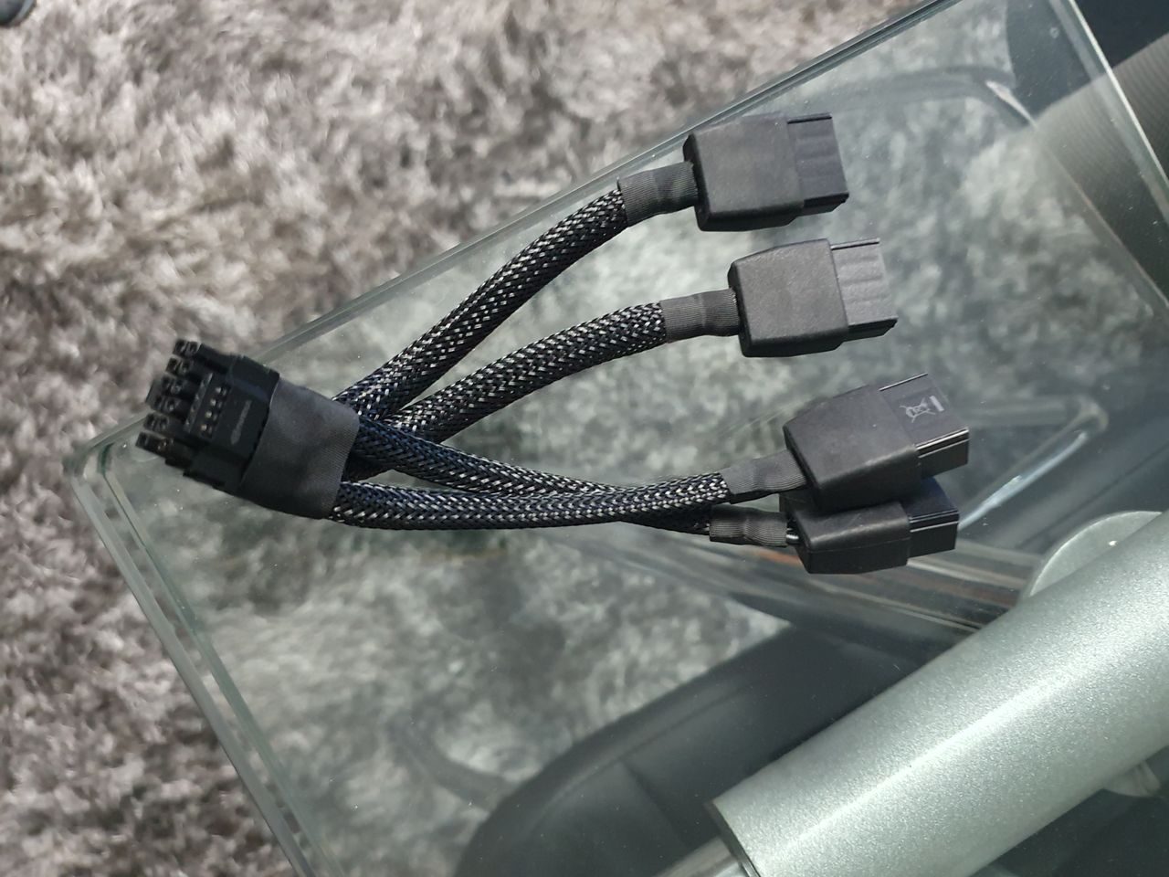 Melted cable connectors on the RTX 4090's 12VHPWR from DSOGaming