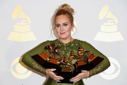 Adele shows of her Grammy awards