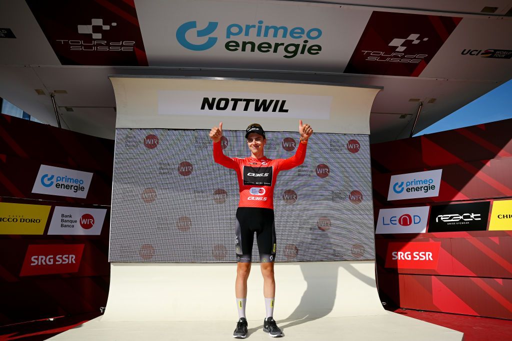 NOTTWIL SWITZERLAND JUNE 12 Nickolas Zukowsky of Canada and Q365 Pro Cycling Team celebrates at podium as Red Mountain Jersey winner during the 86th Tour de Suisse 2023 Stage 2 a 1737km stage from Beromnster to Nottwil UCIWT on June 12 2023 in Nottwil Switzerland Photo by Dario BelingheriGetty Images