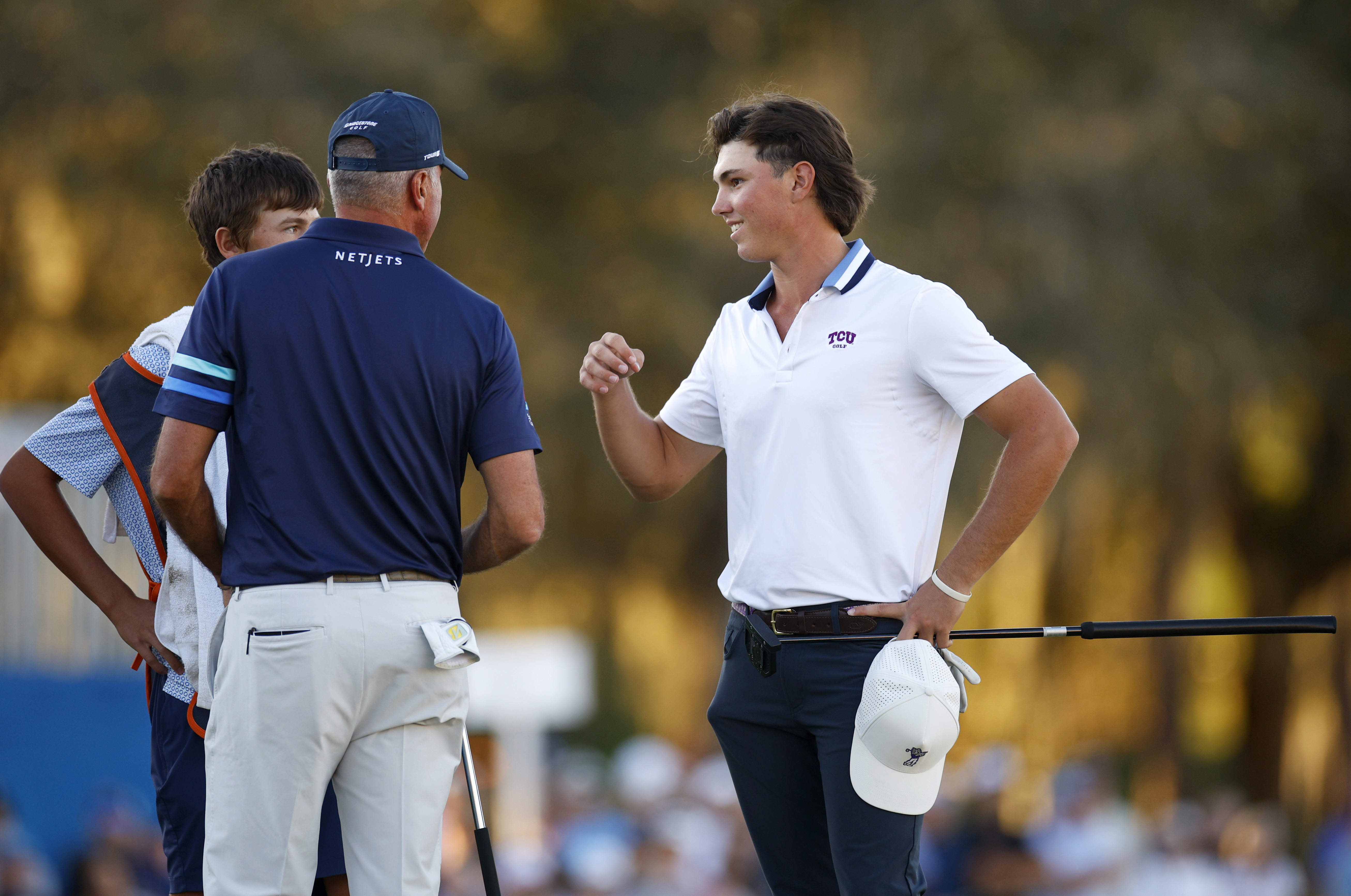 Team Kuchar fist pump
