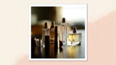 A collection of glass perfume bottles on a table/ in a cream and orange gradient, textured template
