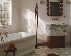 A bathroom with marble trim