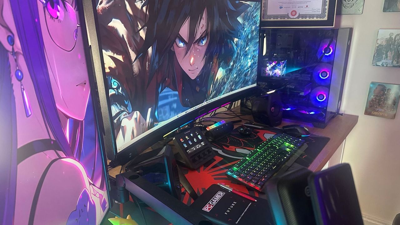 Midas' desk, with two monitors, a Stream Deck, gaming PC, and gaming keyboard