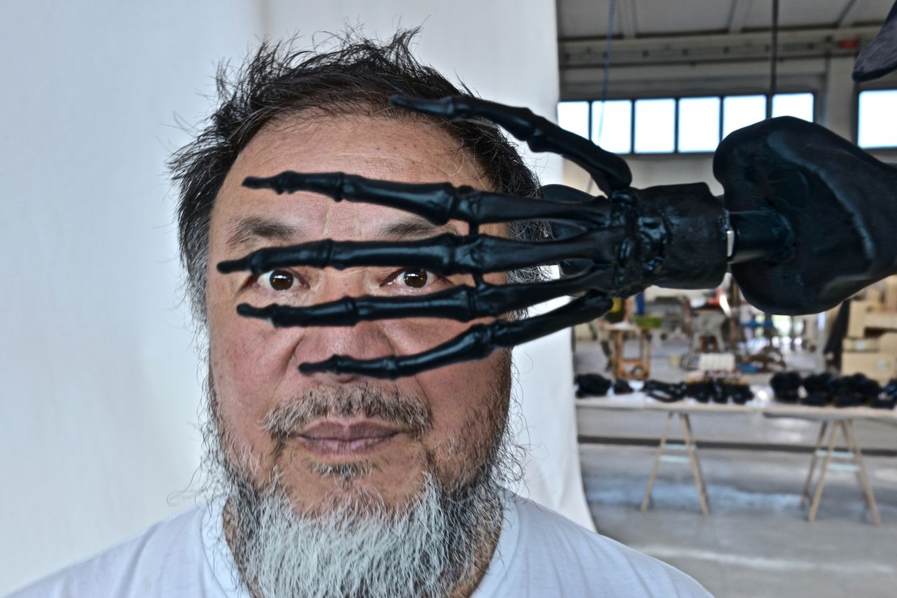 Portrait of ai weiwei ahead of venice exhibition glass sculpture